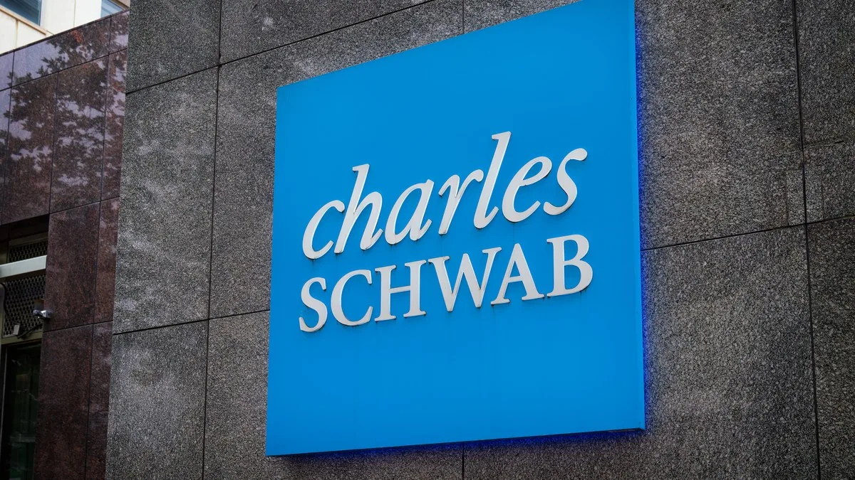 Charles Schwab sign on an office building in Bethesda, Maryland